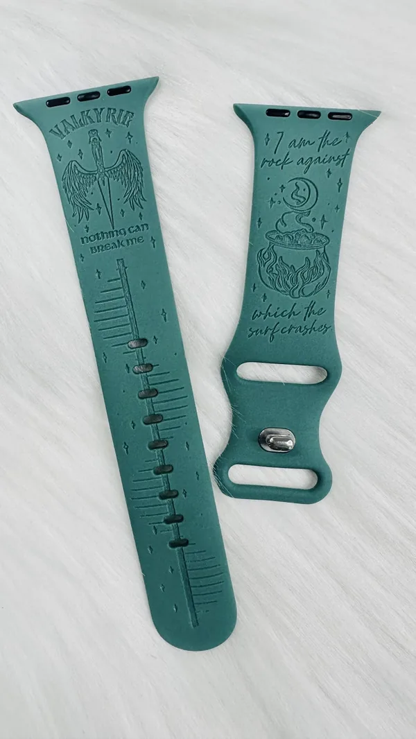 Engraved watch band reading nothing can break me.